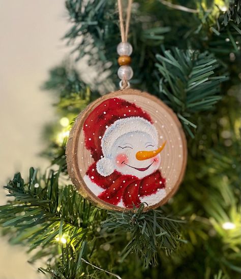 Hand painted Snowman Ornaments, Original Painting on Natural Wood Slice.  Two of the ornaments are not for hanging but are used with the acrylic easel stand. Easel stands are included. Unique decor and perfect gift for your relatives and friends. You can also check my other Handpainted Ornaments: https://setyartgallery.etsy.com/listing/1586212238 * Free Gift Bag available. * Wood slice ornament size +-3.5 inch (natural wood slices, so sizes vary).  * Back Signed You will receive TRACKING number Christmas Wood Slice Painting, Christmas Ornament Wood Slice, Painted Snowman On Wood, Christmas Ornaments Wood Slice, Acrylic Easel, Painted Snowman, Painting Unique, Wood Slice Art, Easel Stand