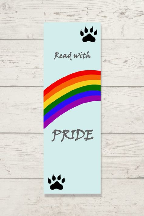 Light Blue bookmark with a rainbow reaching left to right in the center. In the upper right hand, and lower left hand corners have black paw prints. Reads "Read with" above the rainbow, and "Pride" below the rainbow. Lgbtqia Art, Bookish Art, Cute Bookmarks, Canvas Painting Designs, Rainbow Art, Bookmarks Handmade, Diy Canvas Art, Diy Canvas, Lovers Gift