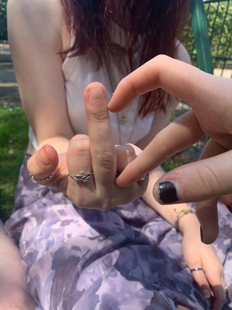 Gen Z Couple Aesthetic, Nonbinary Love Aesthetic, Nonbinary Relationship Aesthetic, Lesbian Rings Hands, Wlw Rings, Gf Pics Aesthetic, Wlw Hand Placement, Heart Hands Aesthetic, Middle Finger Pose