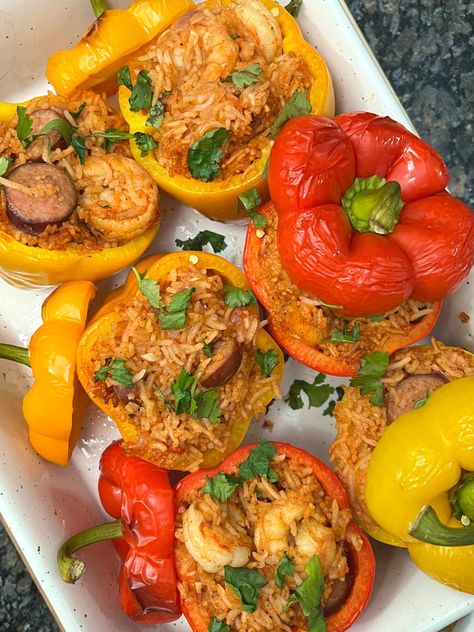 six jambalaya stuffed peppers in a baking dish Smoked Sausage And Shrimp, Jambalaya Rice, Shrimp Rice, Holiday Lunch, Rice Stuffing, Mardi Gras Food, Jambalaya Recipe, Shrimp And Rice, Diced Chicken