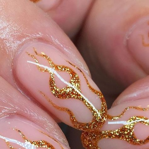 Yan Tee on Instagram: "Golden flames for Louise I could stare into this glitter forever x #naturalnails #flamenails #goldflames #nailinspo #manchesternails" Glitter Fire Nails, Gel Nails Flames, Gold Flames Nails, Sparkly Flame Nails, Black And Gold Flame Nails, Flame Accent Nail, Flames Nails, Fire Nails, Nails Nails