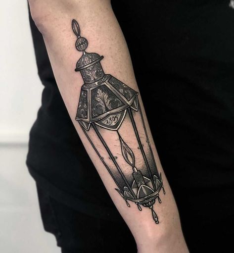 Neo-traditional black and grey lantern tattoo by Lozzy Bones inked on the right forearm Lantern Tattoo Design, Neo Traditional Tattoos, Tattoo Black And Grey, Lamp Tattoo, Lantern Tattoo, Occult Tattoo, C Tattoo, Back Of Shoulder Tattoo, Classy Tattoos