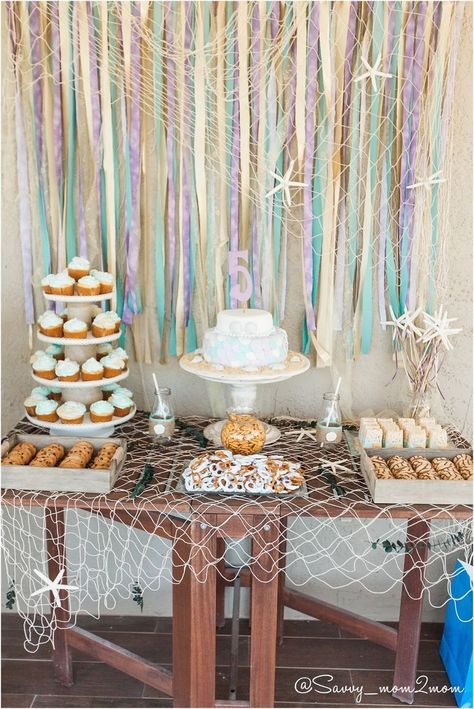 mermaid birthday party tablescape Mermaid Party Ideas, Mermaid Bachelorette Party, Mermaid Bridal Showers, Cake Table Backdrop, Mermaid Bachelorette, Mermaid Pool Parties, Sea Party Ideas, Under The Sea Birthday Party, Table Backdrop