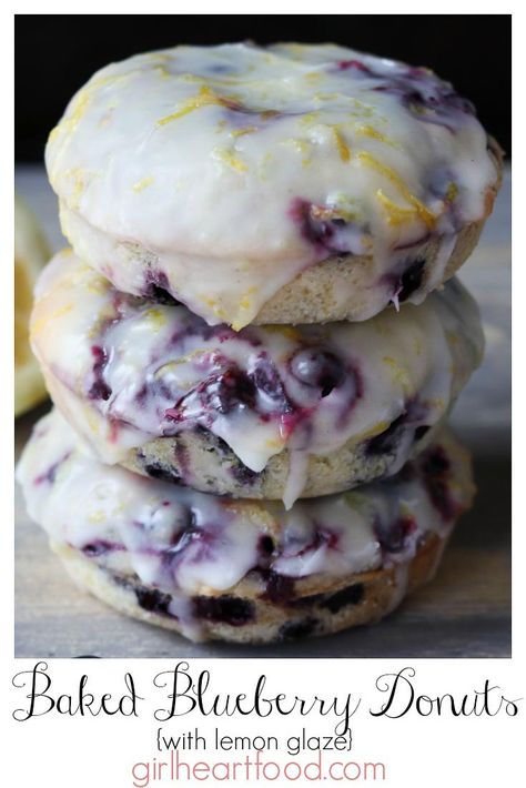 Fluffy and delicious, these Baked Blueberry Donuts are super easy to prepare.  Topped with a simple Lemon Glaze with flecks of fresh lemon zest, these baked donuts make for one yummy treat! #bakeddonuts #donuts #blueberrydonuts #lemonglaze #easydonutrecipe Blueberry Donuts With Lemon Glaze, Blueberry Donuts, Easy Donut Recipe, Homemade Donuts Recipe, Baked Donut Recipes, Lemon Glaze, Homemade Donuts, Doughnut Recipe, Blueberry Recipes