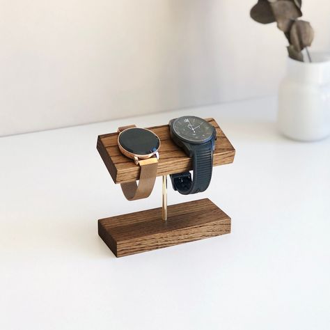 Watch holder | Watch stand | Watch display | Wood and brass watch organizer A modern, casual and unique watch stand designed to comfortably accommodate various types and sizes of watches. It is lovingly made of wood and brass in our workshop and has a 20 degree inclination for you to display your watches comfortably. The warm combination of chocolate wood stain and brass make this watch holder a beautiful addition to any space. It looks great on a nightstand, vanity or dresser while providing yo Watch Holder Ideas, Watch Display Ideas, Leather Watch Accessories With Analog Display For Business, Watch Stand Design, Brown Analog Display Watch Accessories For Business, Watch Display Stand, Wooden Watch Stand, Masculine Jewelry, Watch Organizer