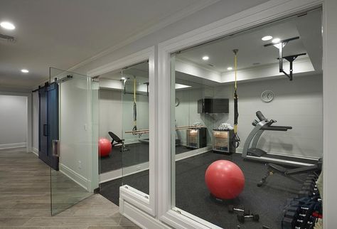 Basement Home Gym with Glass Door - Contemporary - Basement Basement Home Gym, Home Gym Flooring, Basement Gym, Gym Room At Home, Gym Interior, Small Basements, Best Home Gym, Home Gym Design, Basement Design Ideas