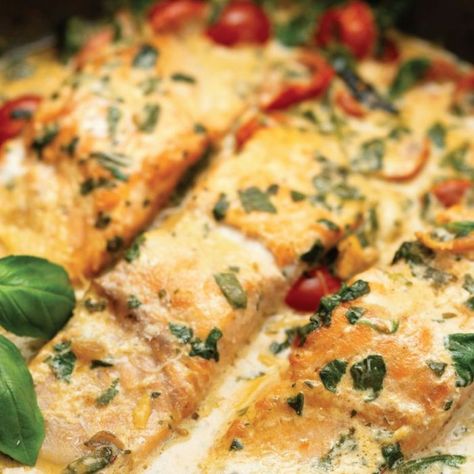 Creamy Tuscan Salmon with Garlic Butter and Spinach Salmon Tuscan Recipe, Tuscan Butter Salmon, Tuscan Garlic Salmon Skillet With Spinach And Tomato, Tuscan Butter Salmon In Tomato Spinach Cream Sauce, Creamy Tuscan Salmon Pasta, Salmon Spinach, Spinach Recipes, Roma Tomatoes, Crusty Bread