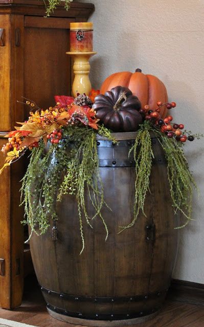 Fall Barrel Decor, Fall Front Porch Decor Wine Barrel, Wine Barrel Porch Decor, Fall Whiskey Barrel Ideas, Fall Barrel Planter Ideas, Butter Churn Decor Ideas, Wine Barrel Garden, Whiskey Barrel Decor, Meat Festival