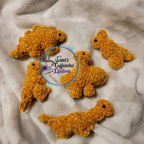 Thanks for the kind words! ★★★★★ "So cute and soft." Jenny M. https://etsy.me/3wH7Tl6 #etsy #dinonuggies #nuggies #nuggets #dinosaur #dinos #crochet #trex #brontosaurus #parasaurolophus Crochet Dino Chicken Nugget Pattern, Dino Nuggies Crochet Pattern, Crochet Dino Chicken Nugget, Dino Nuggets Crochet Pattern, Dino Nuggets Crochet, Crochet Dino Nugget Pattern, Dino Nugget Crochet Pattern, Dino Nugget Crochet, Chicken Nugget Crochet Pattern