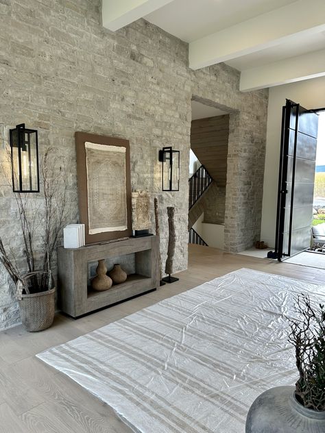 Accent Stone Wall, Faux Stone Wall Interior, Stone Wall Interior Design, Stone Accent Wall, Mountain House Interior, Foyer Wall, Hacienda Homes, Faux Stone Walls, Stone Walls Interior