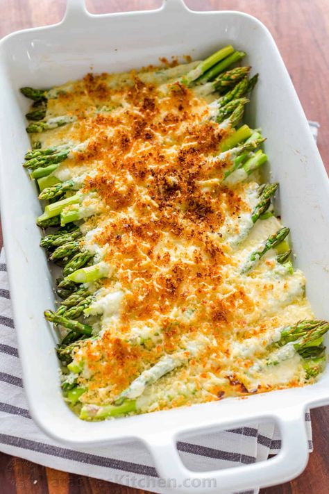 Asparagus Casserole in a creamy Alfredo sauce topped with crisp cheesy bread crumbs. This asparagus bake is an easy and impressive side dish. #asparaguscasserole #asparagus #asparagusbake #asaparagusrecipe #natashaskitchen #sidedish Vegan Asparagus Recipes, Asparagus Casserole Recipes, Best Asparagus Recipe, Asparagus Casserole, Baked Asparagus, Low Carb Casseroles, Vegetable Casserole, Asparagus Recipe, Idee Pasto Sano