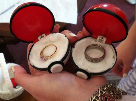 pokemon wedding | instead of a pillow, two pokeballs brought by ... | wedding stuff (th ... Pokemon Ring, Video Game Wedding, Gamer Wedding, Nerd Wedding, Geeky Wedding, Nerdy Wedding, Anime Wedding, Geek Wedding, Pokemon Theme