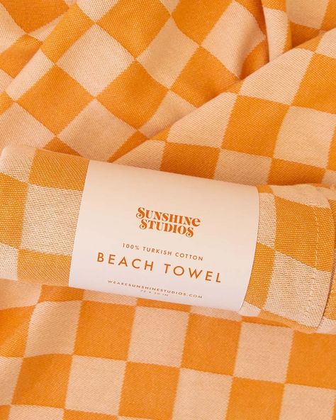 Go ahead and hit the beach in style with Sunshine Studio’s checker-printed towel! With its stay-dry fabric, summertime vibes, and trendy golden checker pattern, you'll be a standout at the shore or by the pool! The details- 72 in. x 30 in. 100% cotton Lightweight + Packable Ultra Absorbent + Quick Drying Cute Beach Towels Aesthetic, Checkered Beach Towel, Beach Towel Aesthetic, Towel Packaging, Pool Dimensions, Trendy Beach Towel, Wonderland Design, Summertime Vibes, Paper Candle