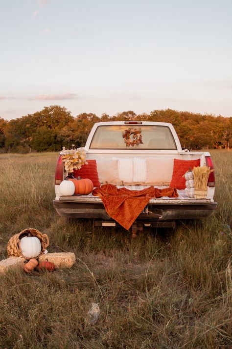 a cozy truck bed fall mini session set up! Truck Picnic Photoshoot, Back Of Truck Fall Pictures, Farm Truck Photoshoot, Fall Photoshoot Props Mini Sessions, Fall Photography Mini Session Ideas, Truck Bed Pictures, Outdoor Christmas Mini Sessions Set Up, Old Truck Fall Photoshoot, Diy Truck Bedding