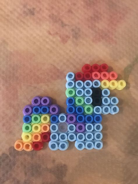 Rainbow dash Rainbow Dash Perler Bead Pattern, Scene Perler Beads, Rainbow Pixel Art, Aquabeads Ideas, Melty Bead Designs, Melty Bead Patterns, Kandi Ideas, Perler Ideas, Easy Perler Beads Ideas