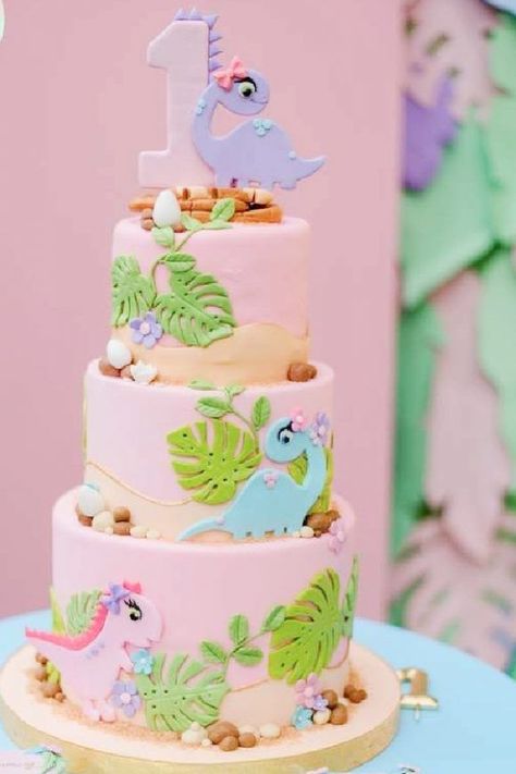 If your looking for ideas for a pink dinosaur birthday cake look no further. This pink-tiered prehistoric cake is adorable and everything a little girl that loves dinosaurs could wish for. What's not to love about these cute fondant dinosaurs with little bows and flowers decorating the cake? See more party ideas and share yours at CatchMyParty.com Dino Birthday Party Ideas, Dino Birthday Cake, Dinosaur Cakes, Dinosaur Birthday Cake, Rose Cakes, Nice Cakes, Girl Dinosaur Birthday, Dinosaur Birthday Party Decorations, Dino Cake