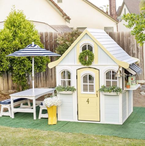 Girls Playhouse Outdoor, Wooden Playhouse Makeover, Kidkraft Playhouse Makeover, Kids Outdoor Table, Kids Wooden Playhouse, Wooden Outdoor Playhouse, Cubby House Ideas, Outdoor Playsets, Outdoor Playhouses