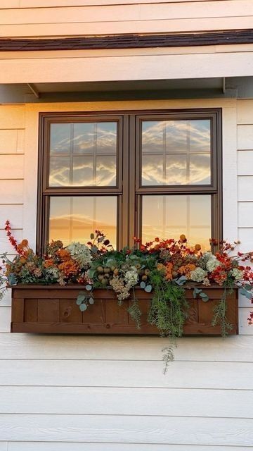 Fall Window Flower Box Ideas, Outside Window Flower Boxes, Fake Plant Window Boxes, Fall Windows Boxes, Flower Boxes Outside Windows, Artificial Flower Window Boxes, Front Of House Window Boxes, Planter Box On House, Window Box With Fake Flowers