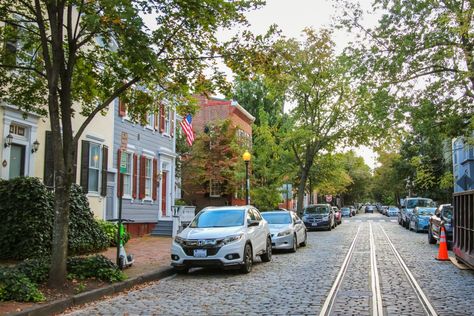 Are you thinking about moving to Washington, DC? The District of Columbia may be known for the city’s rich history and iconic landmarks. However, there’s so much more to living in Washington, DC. The bustling city of DC is full of vibrant culture, international flavors, and historic neighborhoods to explore – such as Georgetown and Cleveland Park. It’s no surprise DC is an appealing place to settle down. If you’re thinking about moving to Washington, DC, you’re most likely interested in… Dc Bucket List, Washington Dc Bucket List, Washington Dc Neighborhoods, Living In Washington Dc, Tips For Moving, The Rainmaker, Jefferson Memorial, Potomac River, National Mall