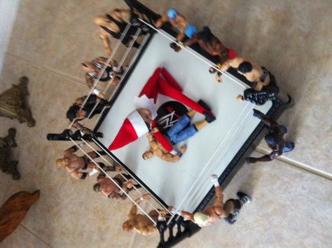 Elf on the shelf wrestling with all the wwe wrestlers! Elf On The Shelf Ideas Wwe, Elf On The Shelf Jesus Style, Wwe Wrestling Ring Valentine Boxes, Elf On The Shelf Manger Scene, Eddie Kingston Wrestler, Wwe Elf On The Shelf, Elf Ideas Easy, Elf On The Shelf Ideas, Elf Ideas