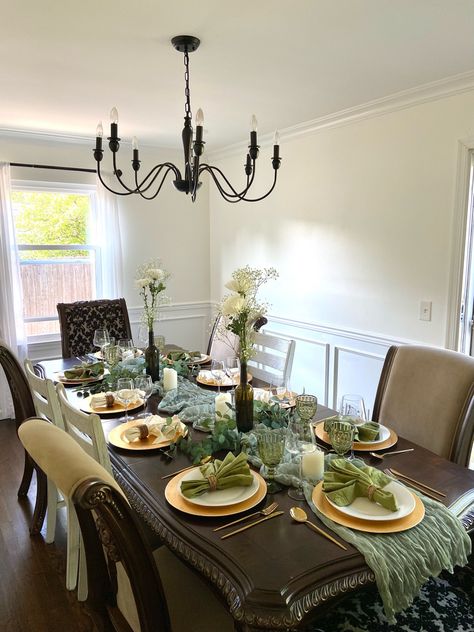 Dinner party. Black vintage hanging chandelier. Sage green table decor. Gold cutlery. Follow my shop @Mrs.JayP on the @shop.LTK app to shop this post and get my exclusive app-only content! #liketkit #LTKFind #LTKSeasonal #LTKhome @shop.ltk Gold Cutlery, Grey Dining Room, Vintage Dining Room, Green Table, Hanging Chandelier, Black Chandelier, Home N Decor, Dining Room Decor, Dinner Party