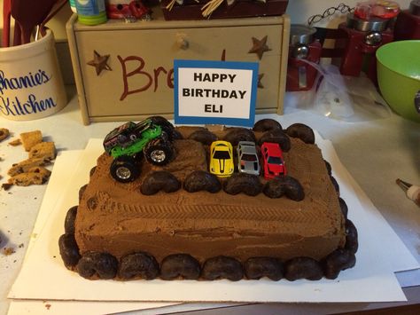 Monster Truck cake for my little cousin Homemade Monster Truck Cake, Monster Jam Birthday Cake Diy, Diy Monster Truck Party Decorations, Monster Truck Sheet Cake, Diy Monster Truck Cake, Monster Truck Cake Ideas, Monster Jam Cake, Monster Truck Birthday Cake, Tire Cake