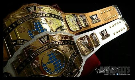 Two WWE Intercontinental Championships. One with a re-leathered white strap and the other re-leathered onto a tan strap. These titles were photographed by Mike Nicolau of Nickelo Graphics. Wwe Intercontinental Championship, Wwe Belts, Intercontinental Championship, Wrestling Belts, Lucha Underground, Wwe Tna, Rich Family, Professional Wrestling, Grappling