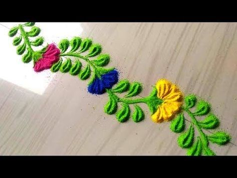 Rangoli designs in 2 minutes/small and everyday border rangoli designs by jyoti Rathod - YouTube Well Rangoli Design, Rangoli Well, Vel Rangoli Design, Rangoli Designs Door Border, Door Rangoli Designs Simple, Door Rangoli, Colourful Rangoli, Colour Rangoli, Border Rangoli