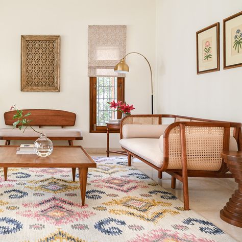 Wood and cane give this airy Bengaluru home a timeless charm | Architectural Digest India Modern Traditional Living Room, Bohemian Interior Design, Modern Bedside Table, Teak Dining Table, Indian Homes, Rattan Sofa, Traditional Living, Traditional Living Room, Rectangular Dining Table