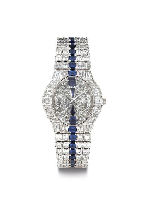 Piaget. A Large, Superlative and Extremely Rare 18k White Gold, Diamond and Sapphire-set Bracelet Watch | SIGNED PIAGET, AURA MODEL, CASE NO. 504'810, REF. NO. 40'011, MANUFACTURED IN 1989 | 1990s, quartz | Christie's Watches Silver, Rolex Watches Women, Coat Women Fashion, Designer Watches, Stacked Jewelry, Fine Watches, Emerald Cut Diamonds, Diamond Watch, Watch Collection