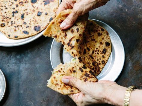 OMAN - Crisp, crackly flatbread loaded with creamy cheese and soft egg. Madhur Jaffrey, Indian Cookbook, Fried Fish Recipes, Egg And Cheese, Flat Bread, Indian Kitchen, India Food, French Pastries, Indian Cooking