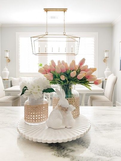 Spring tray styling. Marble turntable lazy Susan tray. Cane rattan glass vases. Faux tulips. Faux hydrangeas. Ceramic bunny . Breakfast Nook. #LTKhome #LTKstyletip #LTKSeasonal Kitchen Table Lazy Susan Decor, Table Lazy Susan Decor, Lazy Susan Decorating Ideas, Lazy Susan Decor, Bunny Breakfast, Easter House Decorations, Faux Tulips, Spring Home Decor Ideas, Easter Kitchen Decor