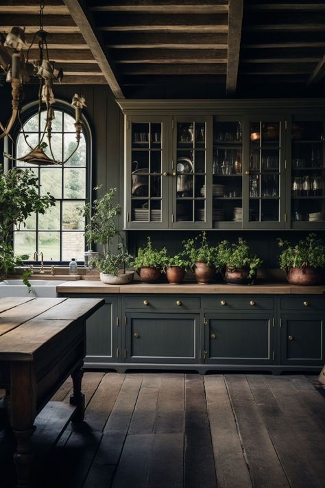 Discover the allure of moody farmhouse kitchen ideas that blend the warmth of traditional rustic design with a hint of contemporary drama. Embrace deep, rich color palettes, weathered wood accents, and vintage-inspired fixtures to infuse your kitchen with an inviting ambiance. Let the interplay of dark hues and natural textures transport you to a space that exudes timeless charm and modern elegance. Gothic Kitchen Ideas, Moody Farmhouse, Moody Kitchen, Old World Kitchens, Gothic Kitchen, Farmhouse Kitchen Ideas, Farmhouse Style Kitchen, Design Del Prodotto, Cottage Kitchen