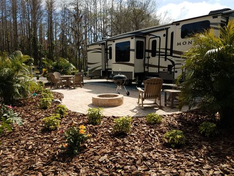 Expansive and lush landscaping surround this RV patio site at the Clearwater/Lake Tarpon KOA Campsite Decorating, Rv Life Hacks, Florida Campgrounds, Rv Lots, Green Camping, Camper Living, Rv Park, Camper Life, Remodeled Campers