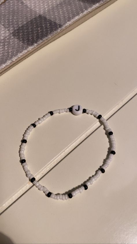 ig - beadsbyhaley Couple Beaded Bracelets Pearl, Beaded White Bracelet For Best Friend, Initial Bracelet Beads, Handmade Themed White Bracelets, Trendy Handmade White Bracelet, Black And White Beaded Bracelet Aesthetic, Couple Bracelets Aesthetic, Best Romantic Song Lyrics, Bracelet Keychains