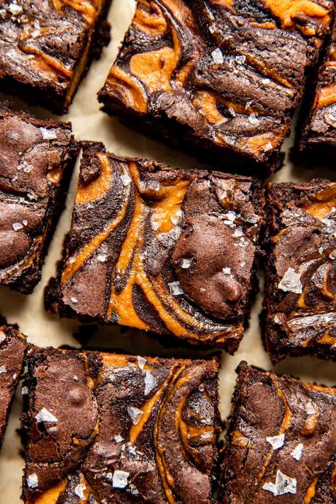 These pumpkin brownies are THE fall dessert I look forward to making the most! They’re rich, fudgy, and full of chocolatey flavor. In fact, they’re so delicious that my family doesn’t even notice that I’ve snuck in some better-for-you ingredients.