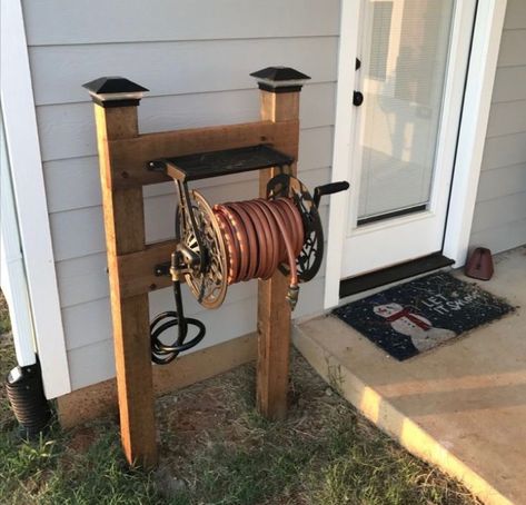 Spring Backyard, Garden Hose Storage, Garden Hose Holder, Hose Storage, Hose Holder, Front Porch Ideas Curb Appeal, Hose Reel, Front Porch Ideas, Diy Garden Projects