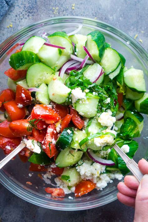 Zesty tomato cucumber feta salad is an essential summer salad loaded with cucumbers, tomatoes, Greek feta, and lemony dressing. It goes with everything! Cucumber Sides, Bark Mitzvah, Cucumber Tomato Feta Salad, Probiotic Recipes, Tomato Feta Salad, Tomato Salad Dressing, Lemony Dressing, Cucumber Salad Dressing, Baseball Banquet