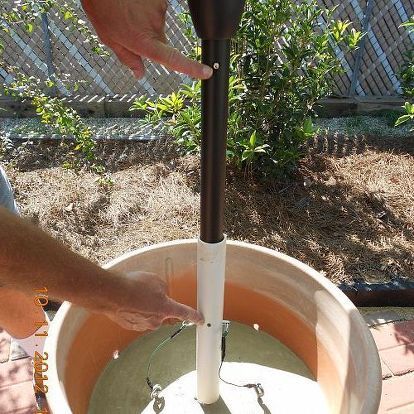 umbrella holder in a cement plant container | Hometalk Cement Umbrella Stand, Umbrella Holder, Canopy Outdoor, Annual Plants, Potting Soil, Umbrella Stand, Container Plants, Flower Pot, Cement