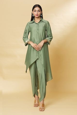 Buy Green Cotton Silk Embroidery Bead Asymmetric Tunic And Draped Skirt Set For Women by Aakaar Online at Aza Fashions. Indo Western Outfits For Women, Draped Pants, Drape Pants, Floral Frocks, Beautiful Casual Dresses, Tunic Designs, Green Tunic, Festival Skirts, Stylish Maternity Outfits