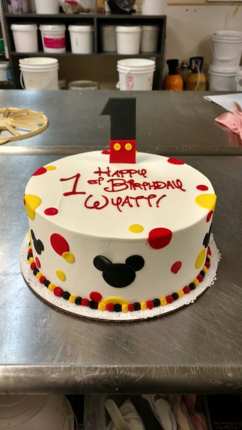 A festive first birthday cake featuring a Mickey Mouse fondant one.: Mickey Mouse Torte, Mickey Mouse Fondant, Mickey Mouse 1st Birthday Cake, Birthday Cake Mickey Mouse, Bolo Do Mickey Mouse, Levi Birthday, Cupcakes Minnie Mouse, Cake Mickey Mouse, Mickey Birthday Cakes