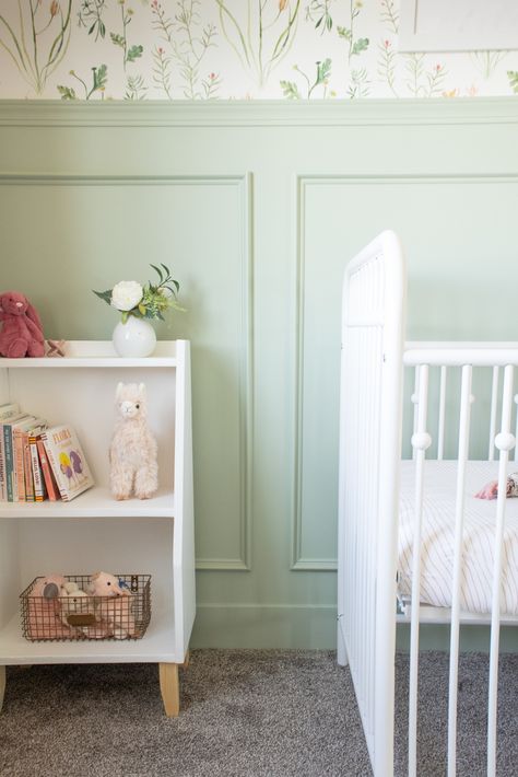 Green Feminine Nursery, Nursery With Two Windows, Paneling Walls Nursery, Minimalist Wallpaper Nursery, Green Panelled Nursery, Sage Paint Nursery, Sage Green Wainscoting Nursery, Wainscoting With Wallpaper Nursery, Sea Foam Nursery