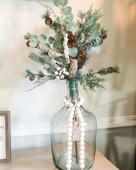 Green And Grey Christmas Decor, Eucalyptus Christmas Decor Vase, Sage And White Christmas Decor, Christmas White And Green, Green And Wood Christmas Decor, Winter Vase Decor, Sage Green And White Christmas Decor, Christmas Glass Vase Decor, Green White Christmas Decor