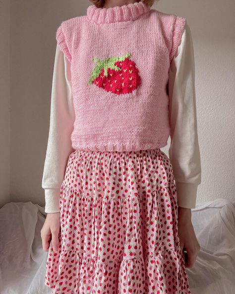 ⋆.˚𐙚❀ 🍓 strawberry sweater vest 🍓 ❀𐙚⋆.˚ Lately I’ve been really into knitting, especially sweater vests. I started this a few weeks ago on my trip to france and finished it on a rainy evening two weeks ago. 🌧️ In comparison to crocheting, knitting is a lot more repetitive and calming on the mind. I especially love the clicking of the knitting needles together. 🧶 #knit #knitting #fibreart #sweatervest #coquette #strawberry #cottagecore Strawberry Sweater Vest, Strawberry Cottagecore, Coquette Strawberry, Strawberry Sweater, Rainy Evening, Knitted Stuff, Trip To France, Sweater Vests, My Trip