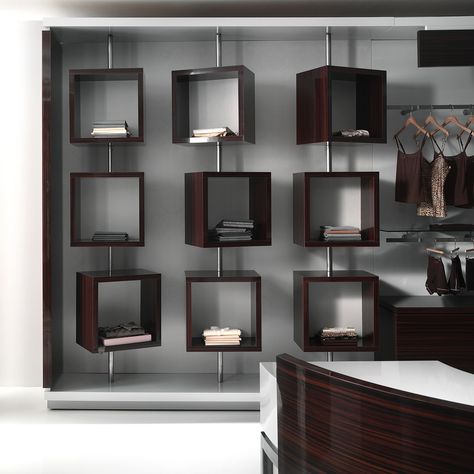 The “C-shaped” system, which features a single finishing backdrop with lateral sections, makes it possible to conceal the shelving support slots. The look is light and minimalist, thanks to the intelligent deployment of floor wells and reveals. In the curved version, the “MW” counter is integrated into the overall design, with co-ordinated finishes. #revolution #shopfitting #crc #italian #design #madeinitaly #arredamento #negozi Luxury Bar Design, Display Shelf Design, Working Wall, Picture Shelves, Wall Shelves Design, Bookshelf Design, Wall Decor Design, Boutique Interior, Store Interior