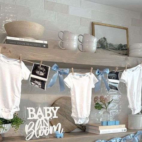 Maternity Fashion Reinvented. 🔥 on Instagram: "Baby in bloom... ✨️🤍👶 @wearisdaniellepratt⁠ ⁠ Follow @wearisdaniellepratt for more decor, toddler fashion, and maternity outfit inspo! ⁠ ⁠ Cake & cupcakes : @frontstreetbakery⁠ Custom cookies: @tailoredcookiesco⁠ Backdrop & balloons: @bruggerandco.decor⁠ Baby in bloom napkins: @enfeteparty" Clothesline Baby Shower Decor, Baby Shower Clothes Line, Baby Shower Clothes, Backdrop Balloons, Onesie Decorating, Maternity Outfit, Baby In Bloom, Cake Cupcakes, Hanging Clothes