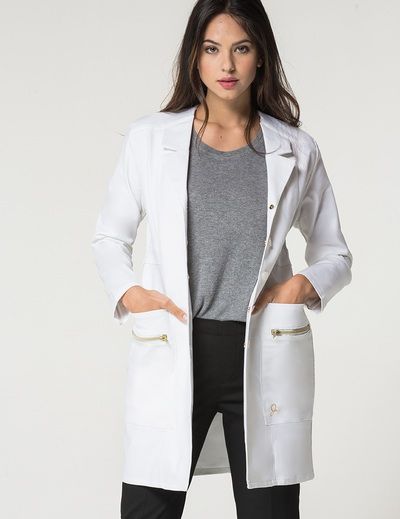 The Signature Lab Coat in White is a contemporary addition to women’s medical outfits. Shop Jaanuu for scrubs, lab coats and other medical apparel. Tshirt Ideas For Women, Lab Coat Fashion, Doctor White Coat, Nurse Dress, White Lab Coat, Doctor Outfit, 40 Fashion Women, Scrubs Outfit, Medical Outfit