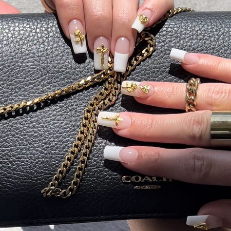 White French with gold gems White French Tip With Gold Gems, White French Tip Nails With Gold Charms, Gold French Tip Nails With Gems, White Nails With Gold Gems, White French With Charms, White French Tip With Gold Charms, French Tips With Gold Charms, French Tip With Gold Charms, Nails Gel X Short