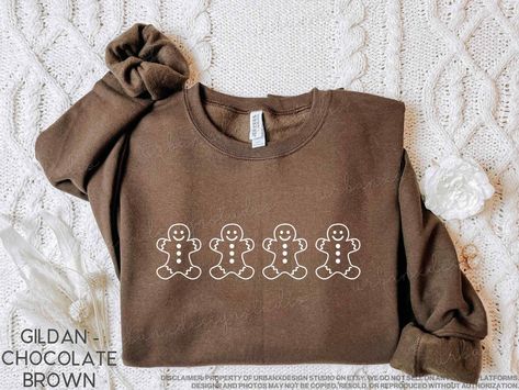 Gingerbread Christmas Sweatshirt, Christmas Baking Sweatshirt, Christmas Baking, Baking Lover Gift, Baking Gift, Holiday Baking Sweatshirt PLEASE NOTE: This is NOT an embroidered sweatshirt Our sweatshirts are unisex, run true to size, and have a great fit.  Order up one or two sizes for an oversized fit!  If you are unsure of your size, please refer to the size chart provided in the additional photos. Any questions about sizing can be answered by the seller. Our sweatshirts are made of cotton a Cookie Sweater, Gingerbread Sweatshirt, Gingerbread Shirt, Holiday Crewneck, Winter Tees, Cookie Shirt, Baking Gift, Cute Christmas Shirts, Gingerbread Cookie