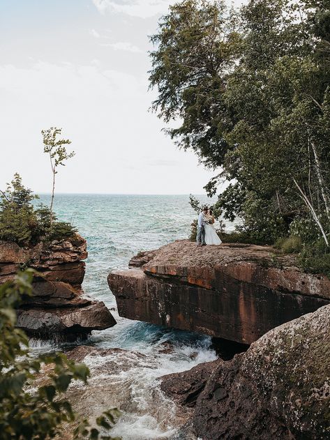 Ashley and Jonathan wanted something simple, but meaningful for their marriage celebration. A simple ceremony on the water. adventure elopement | cliffside elopement | lakeside elopement | wedding photos | elopement photos | wedding photojournalism | minnesota wedding photographer | wisconsin wedding photographer | candid wedding photographer | minneapolis wedding photographer lakeside wedding photos | boat wedding photos | sunny wedding photos | crashing waves wedding photos Madeline Island Wedding, Queer Elopement, Madeline Island Wisconsin, Rainy Elopement, Wisconsin Elopement, Stormy Wedding, Midwest Elopement, Minnesota Elopement, Lake Wedding Photos